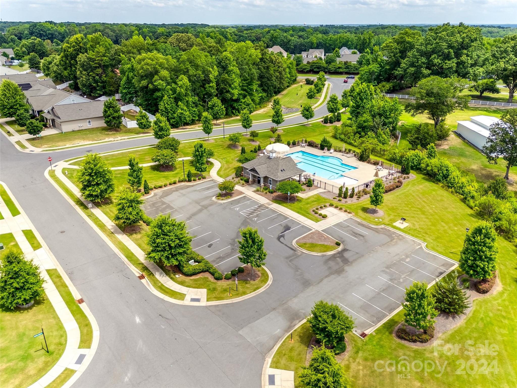 819 Bridge View Court Fort Mill, SC 29708 - Photo 38 of 40 an aerial view of a house with a swimming pool patio and outdoor seating