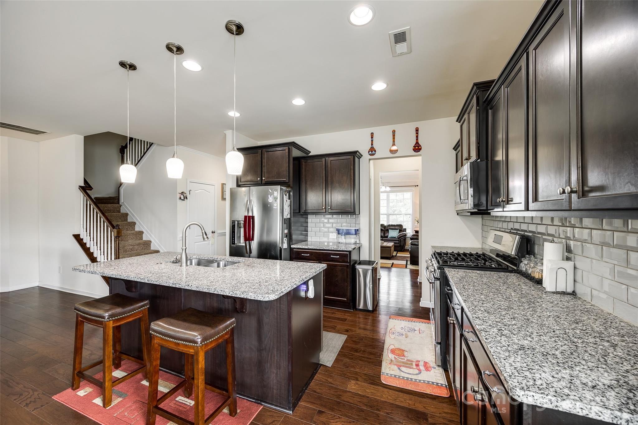 819 Bridge View Court Fort Mill, SC 29708 - Photo 6 of 40 a large kitchen with a table and chairs