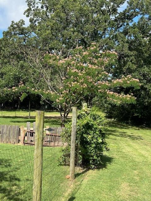 900 Locust Road Pottsboro, TX 75076 - Photo 3 of 12 a view of a garden