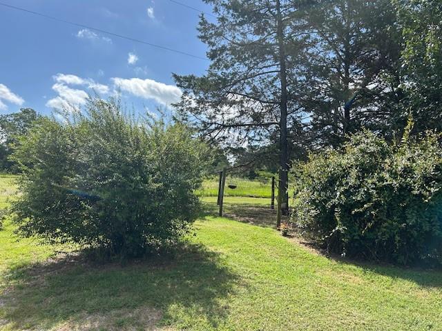 900 Locust Road Pottsboro, TX 75076 - Photo 5 of 12 a view of a park with large trees