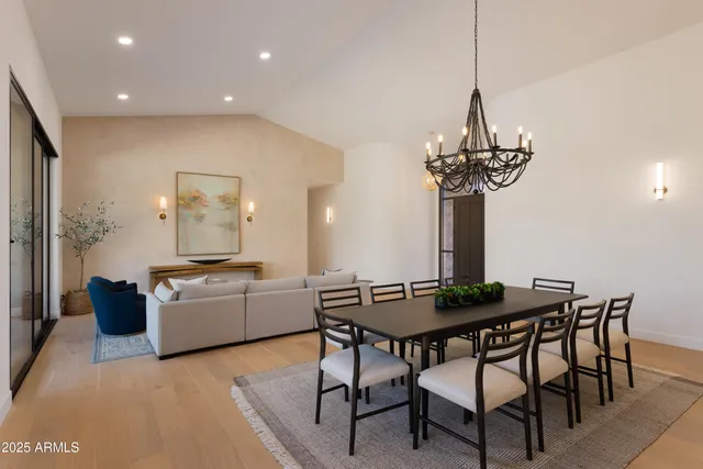 a kitchen with a table and chairs in it