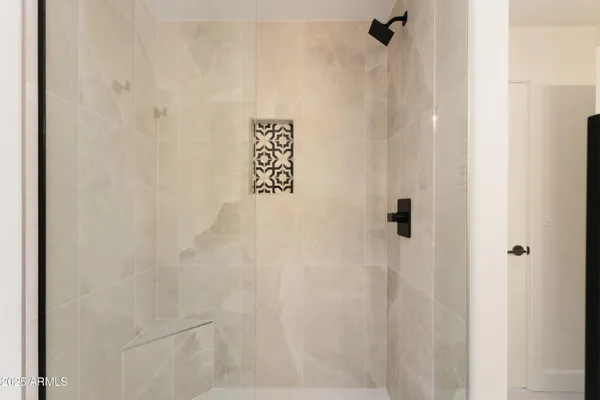 a wall with a shower curtain