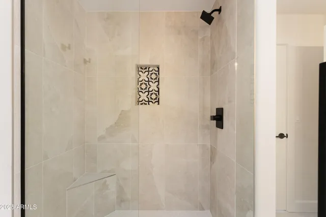 a wall with a shower curtain