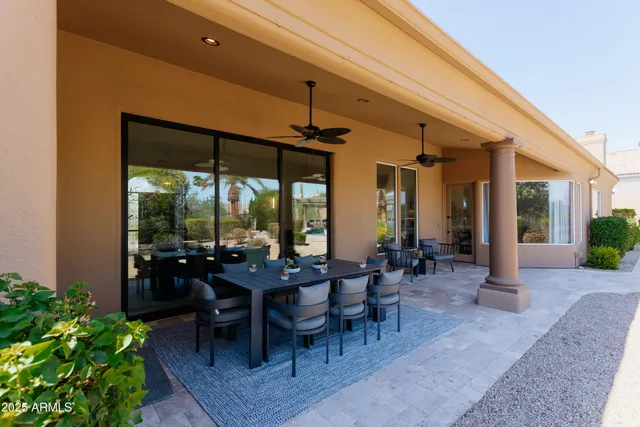 a view of a dining room with furniture window and outside view
