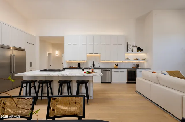 a view of kitchen with cabinets
