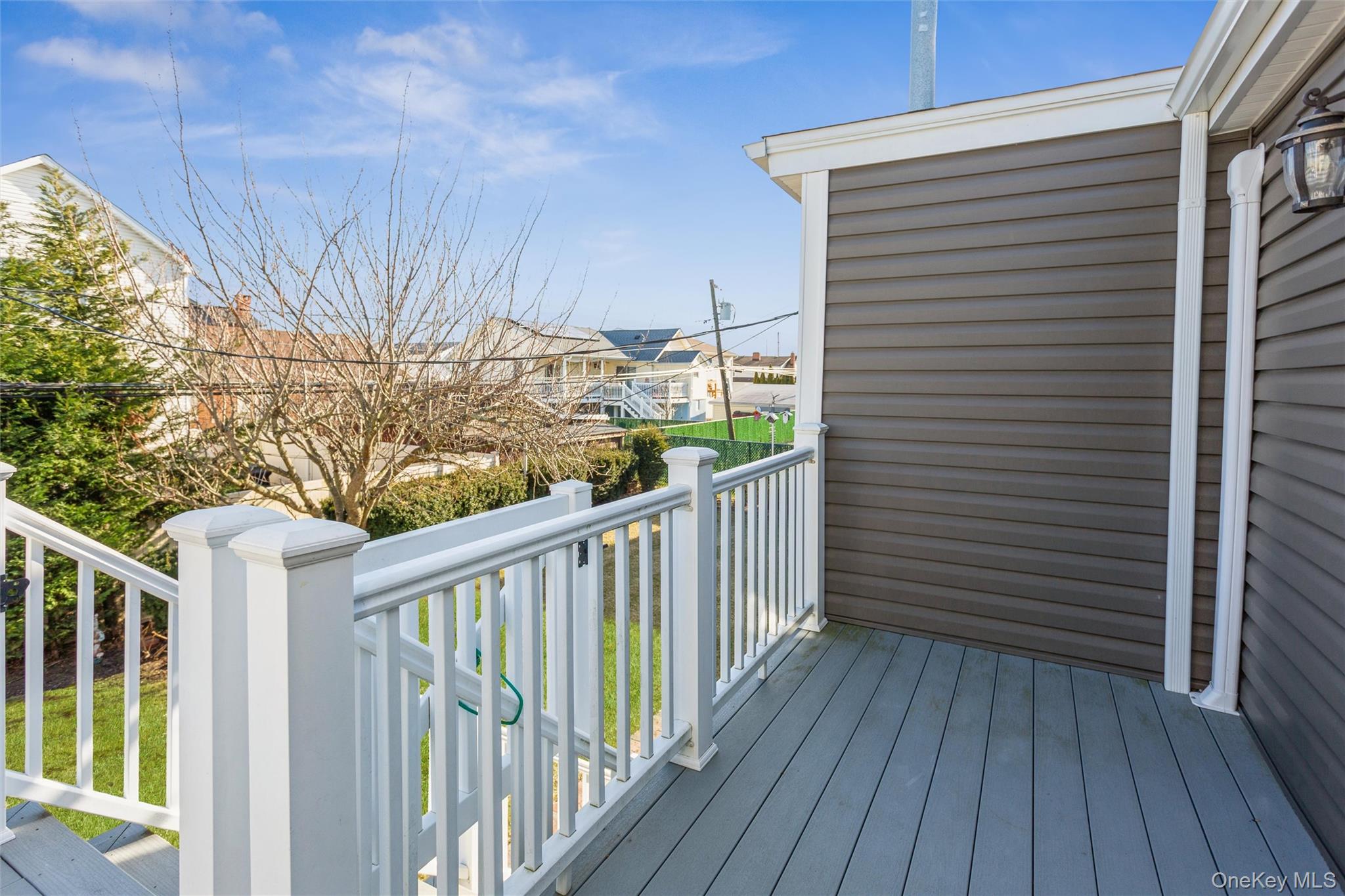 73 Parma Road Island Park, NY 11558 - Photo 17 of 37 a view of a wooden deck