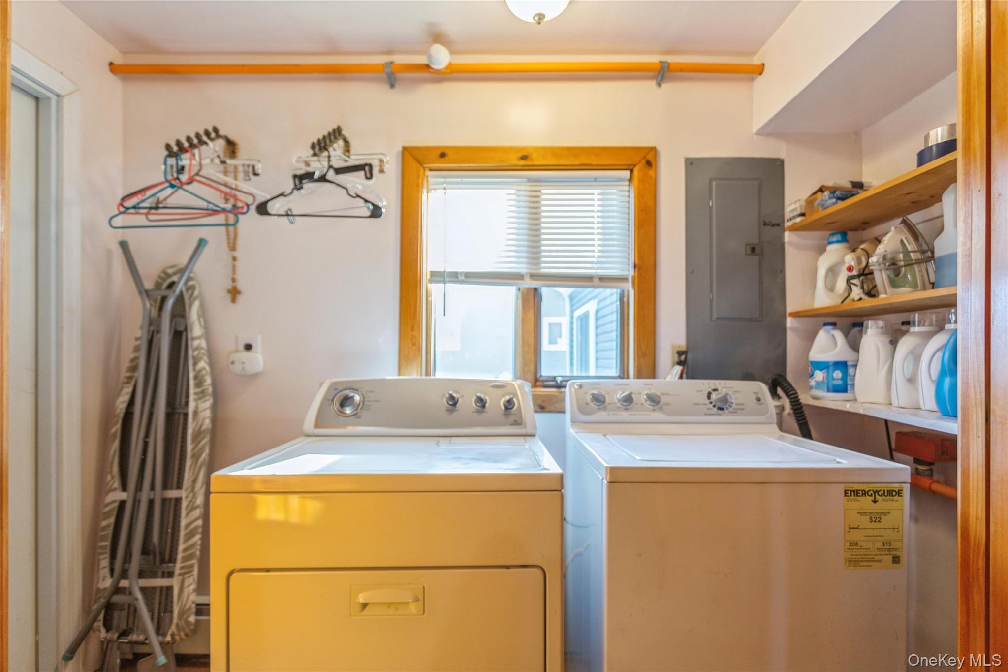 73 Parma Road Island Park, NY 11558 - Photo 18 of 37 a utility room with dryer and washer