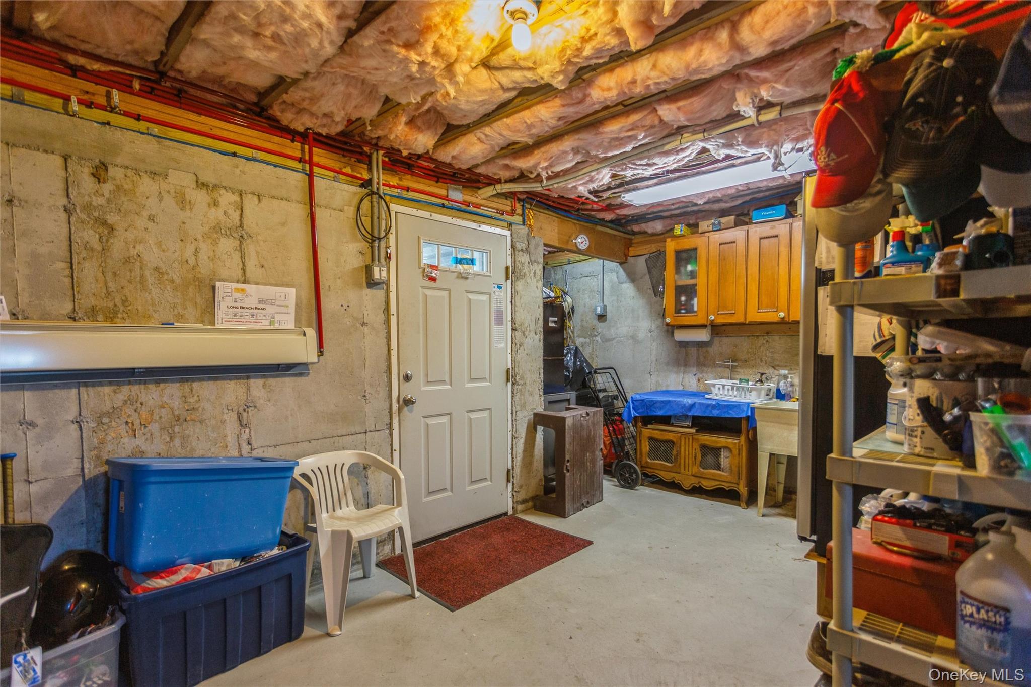 73 Parma Road Island Park, NY 11558 - Photo 25 of 37 a storage room with furniture