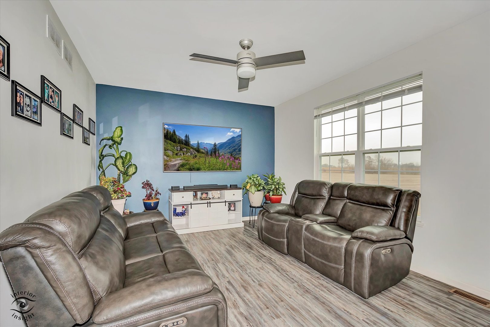 15101 Quincy Way Manhattan, IL 60442 - Photo 13 of 28 a living room with furniture and a flat screen tv