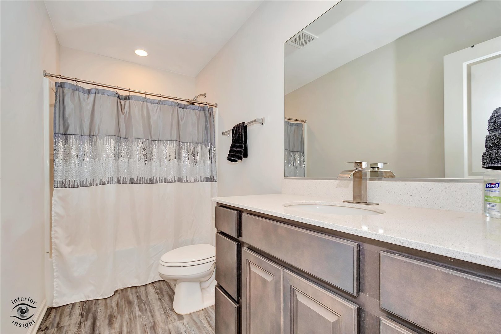 15101 Quincy Way Manhattan, IL 60442 - Photo 24 of 28 a bathroom with a sink a toilet and shower