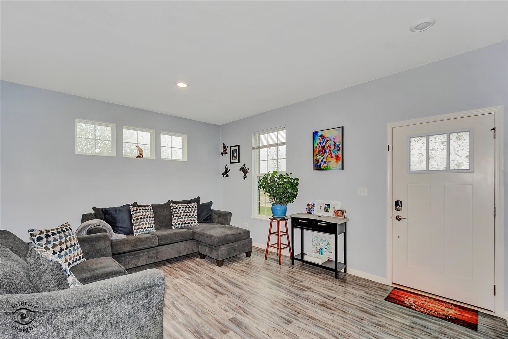 15101 Quincy Way Manhattan, IL 60442 - Photo 7 of 28 a living room with furniture and wooden floor