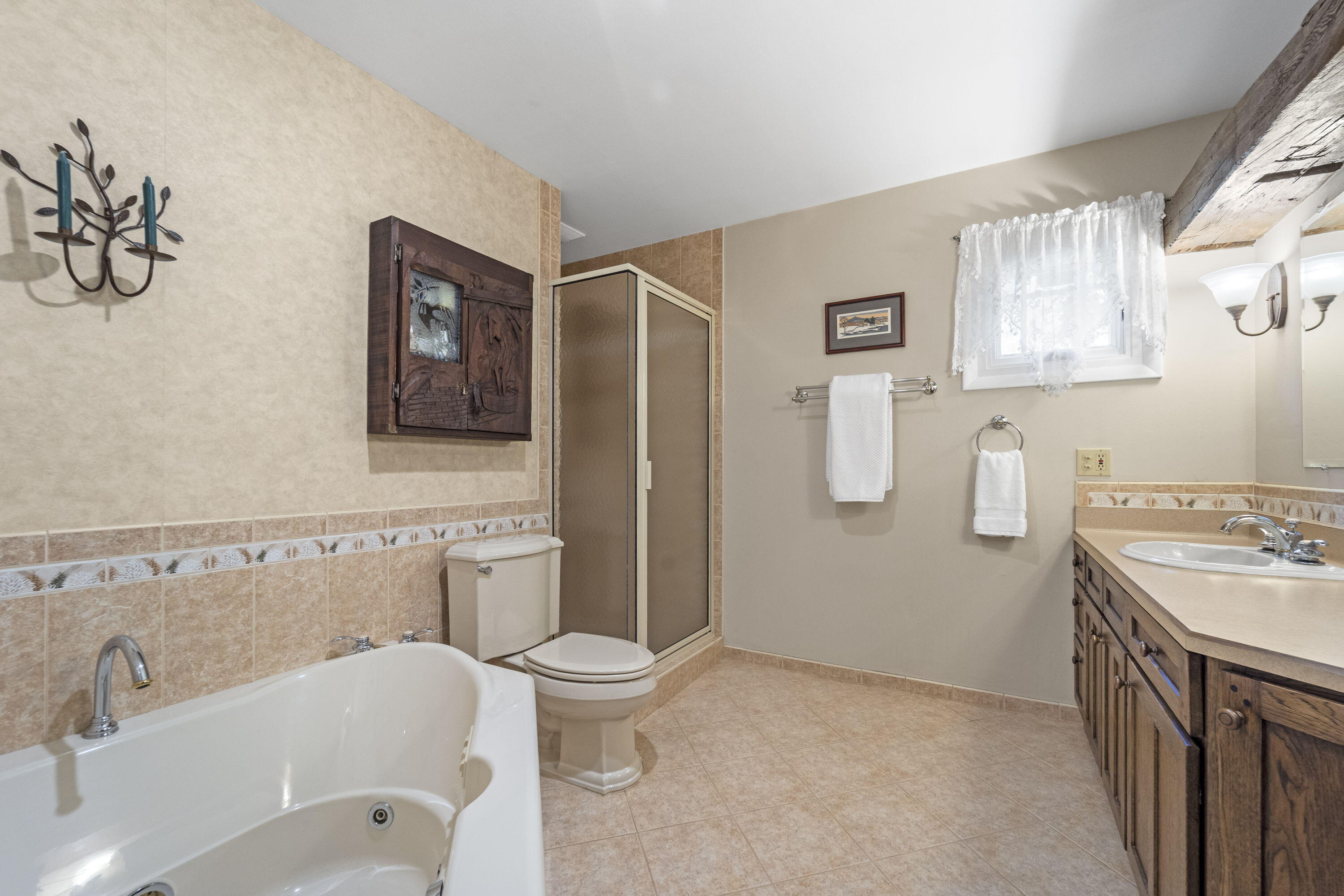 1270 Lake Shore Road Grafton, WI 53024 - Photo 34 of 99 Primary Full Bathroom adjacent to Primary Bedroom.