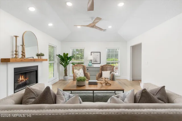 a bathroom with a toilet a sink and a mirror
