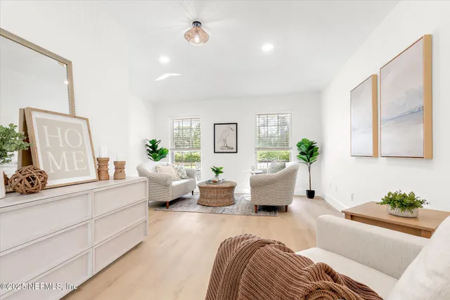 a front view of a house with a large window