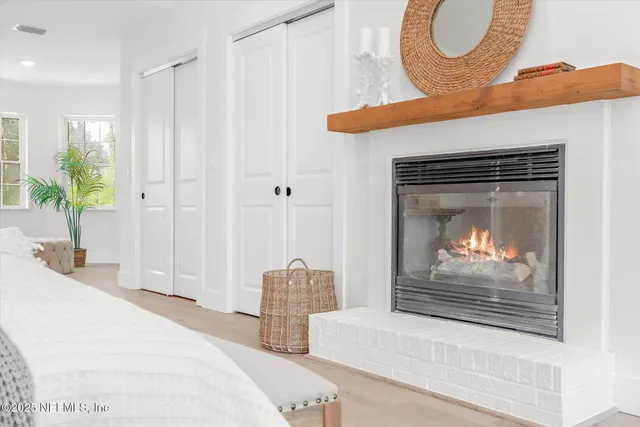 a bed room with a bed and a window