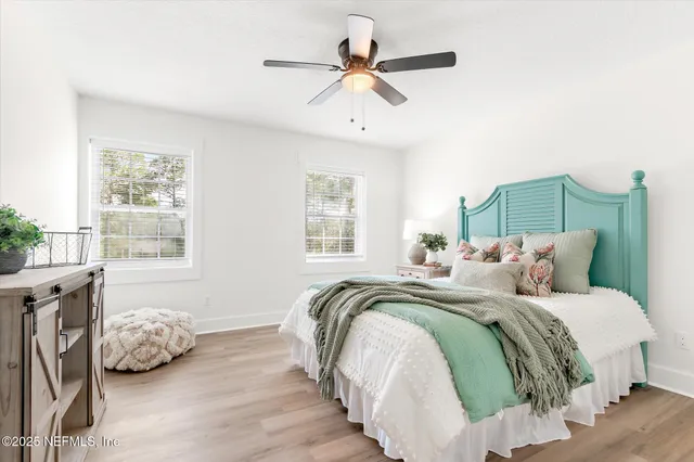 a big yard with lots of green space and trees