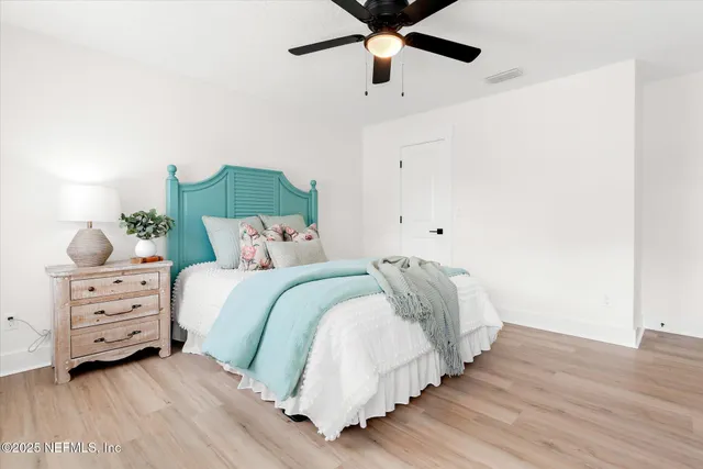 a view of a lake with a big yard