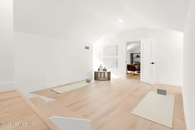 a view of a house with pool and garden