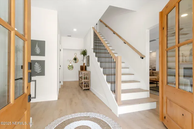 a view of an entryway with staircase