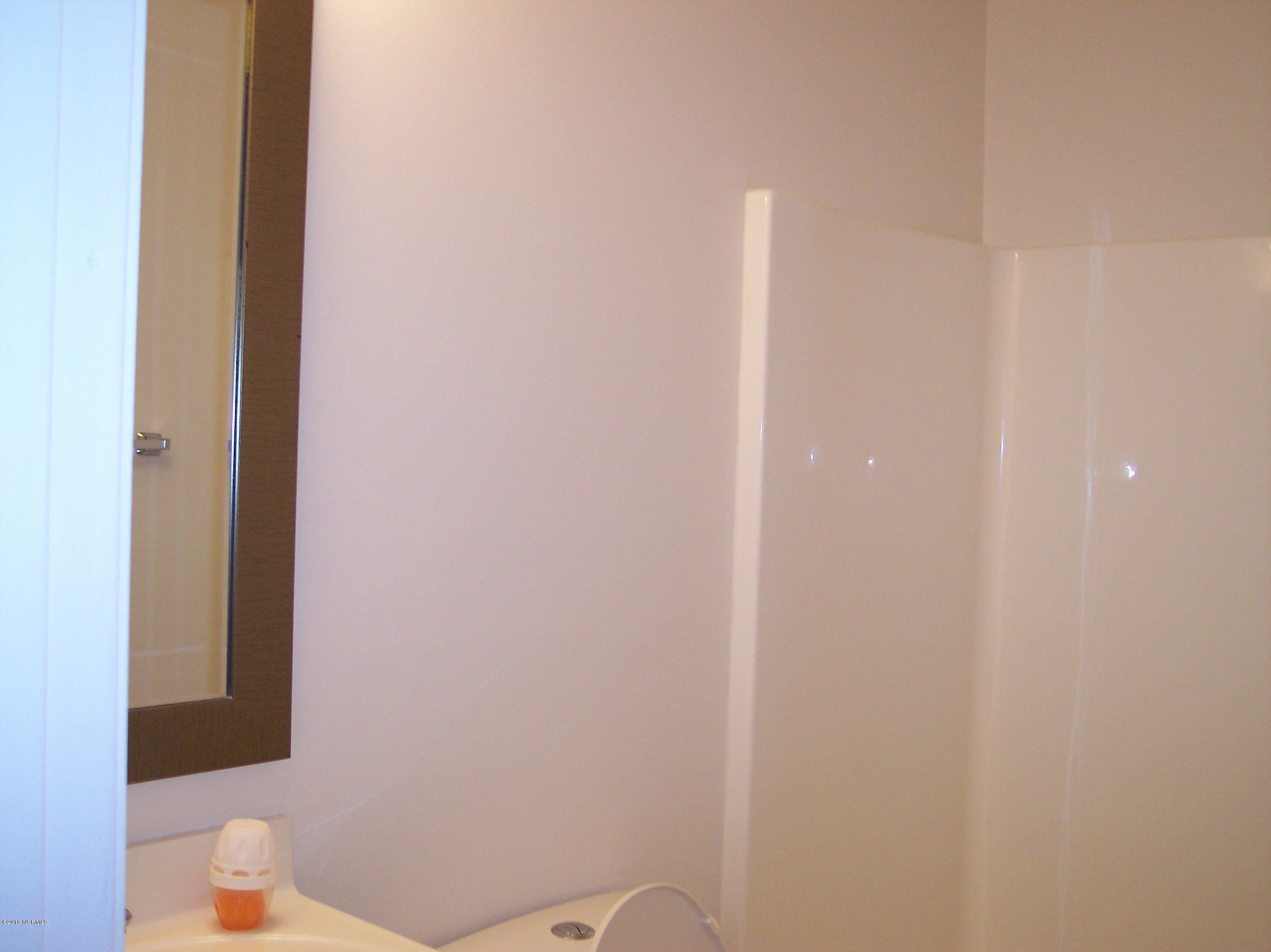 695 Pepperhill Road, Unit BSL Southport, NC 28461 - Photo 14 of 33 Guest bathroom