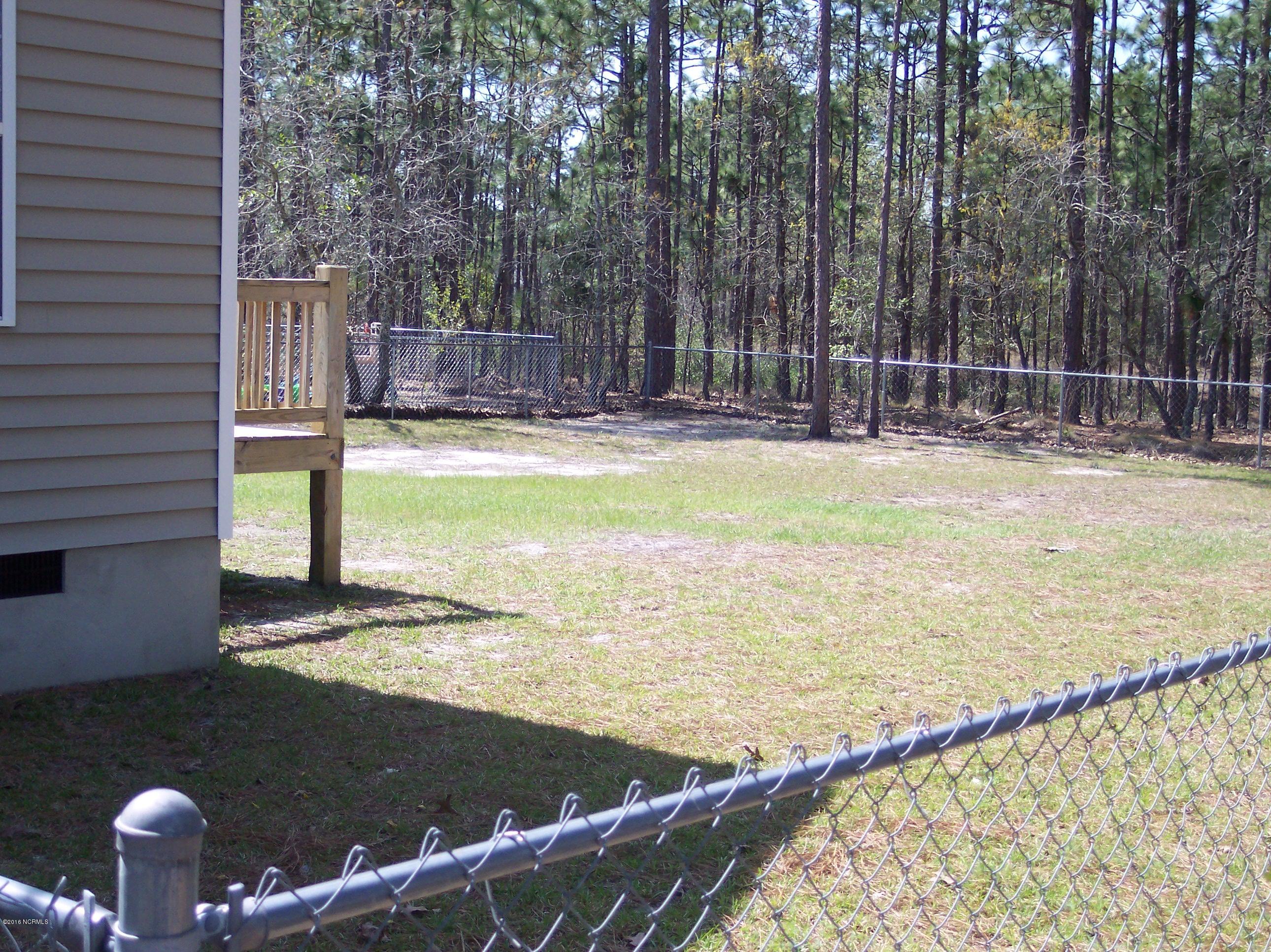 695 Pepperhill Road, Unit BSL Southport, NC 28461 - Photo 19 of 33 Fenced back yard