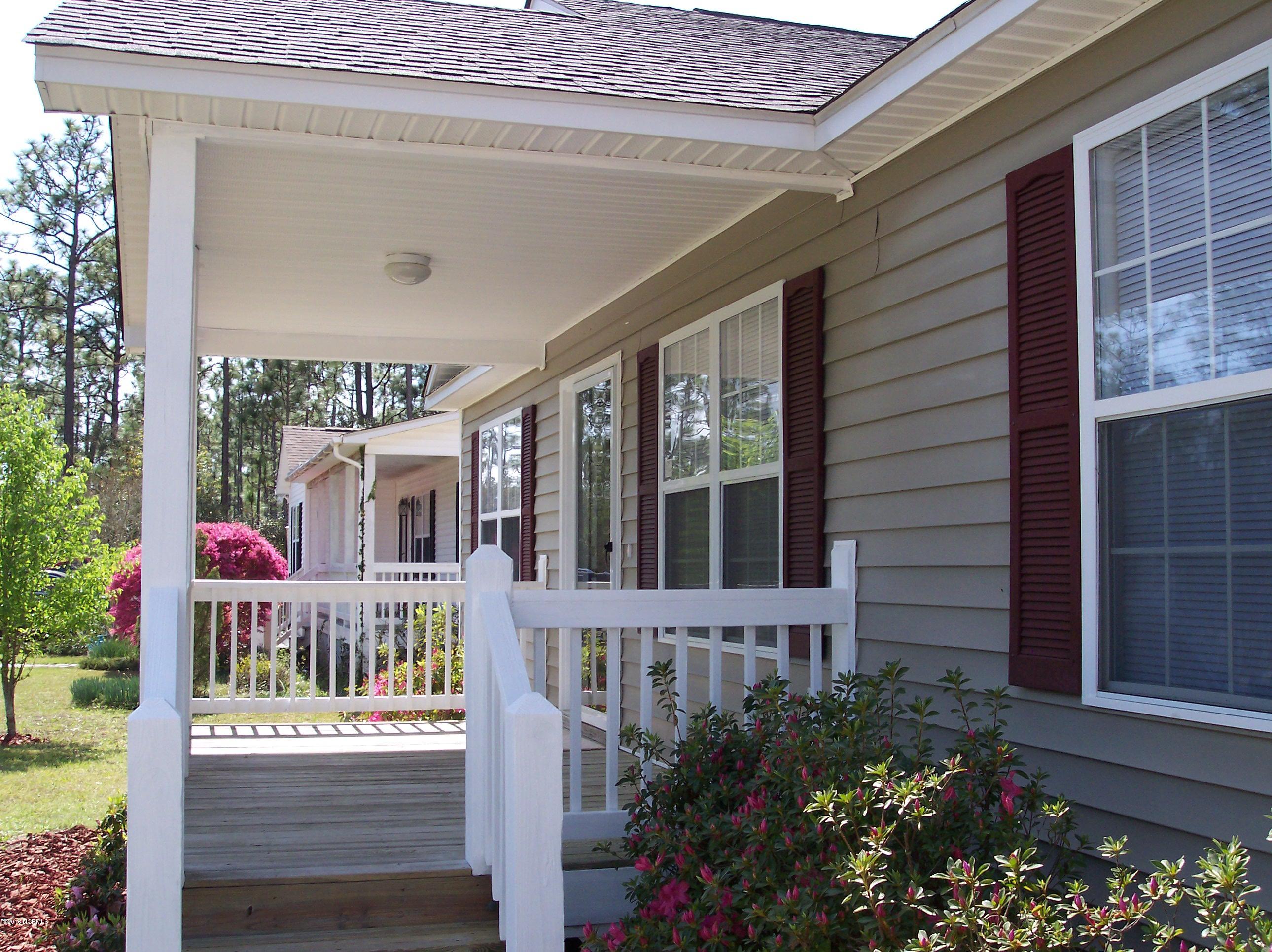 695 Pepperhill Road, Unit BSL Southport, NC 28461 - Photo 22 of 33 Front covered porch