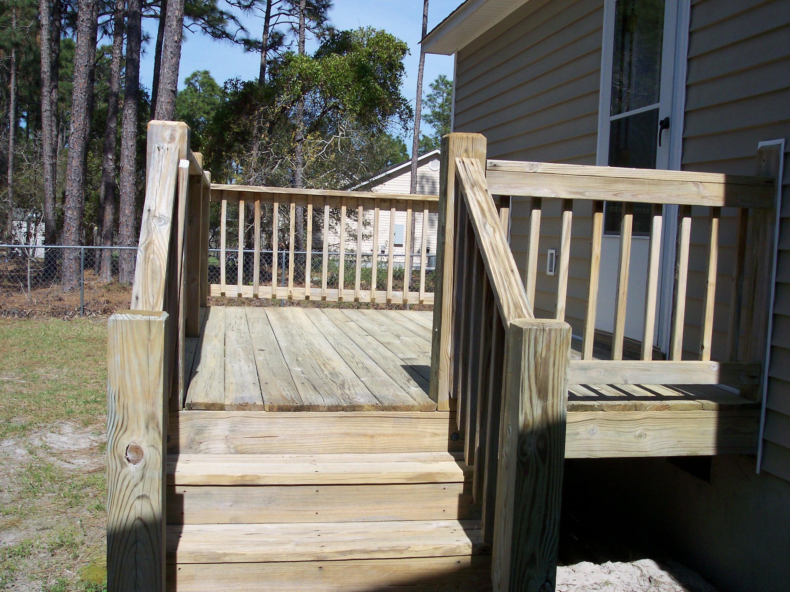695 Pepperhill Road, Unit BSL Southport, NC 28461 - Photo 24 of 33 Back deck