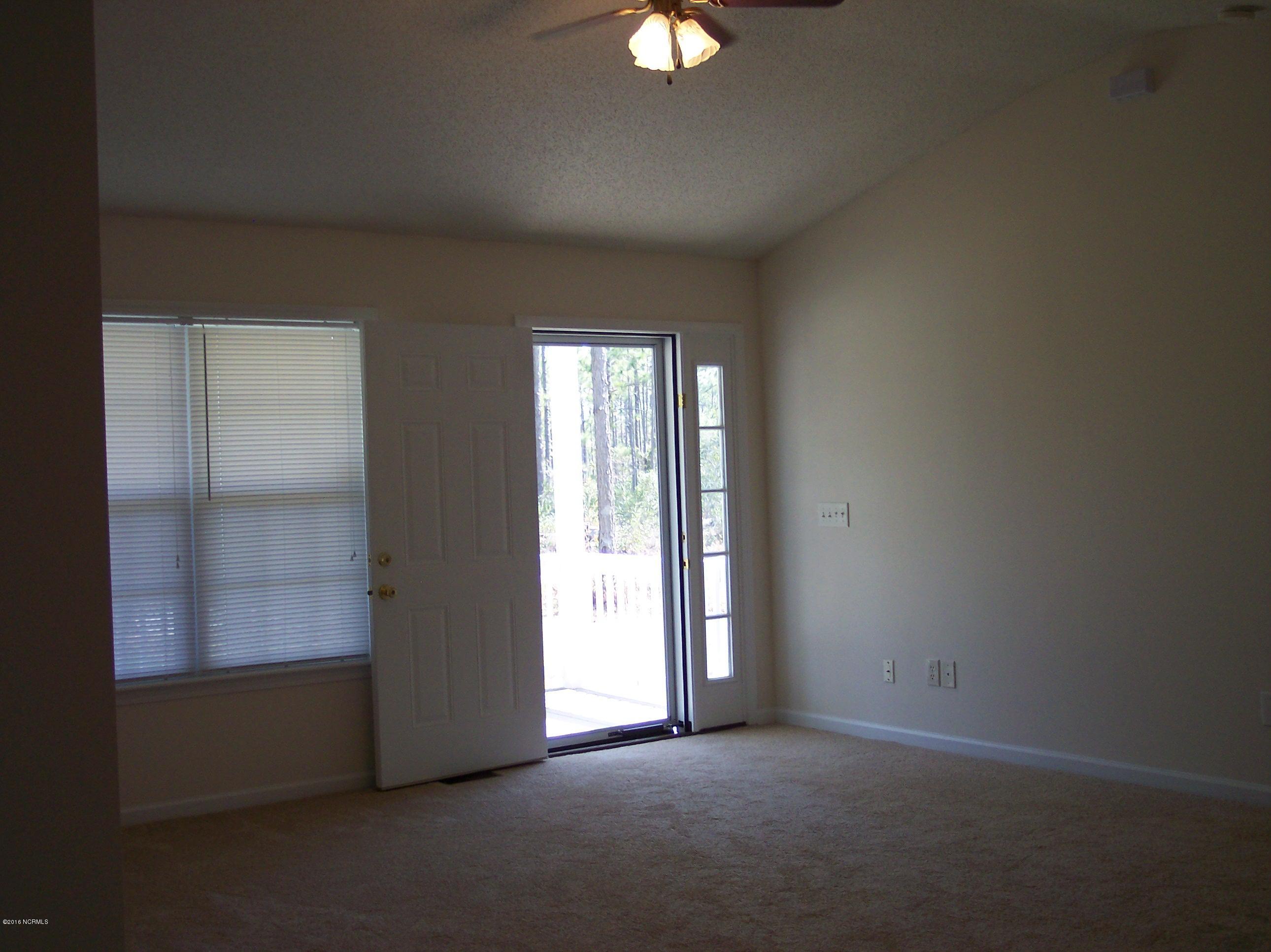 695 Pepperhill Road, Unit BSL Southport, NC 28461 - Photo 6 of 33 Living room looking towards front