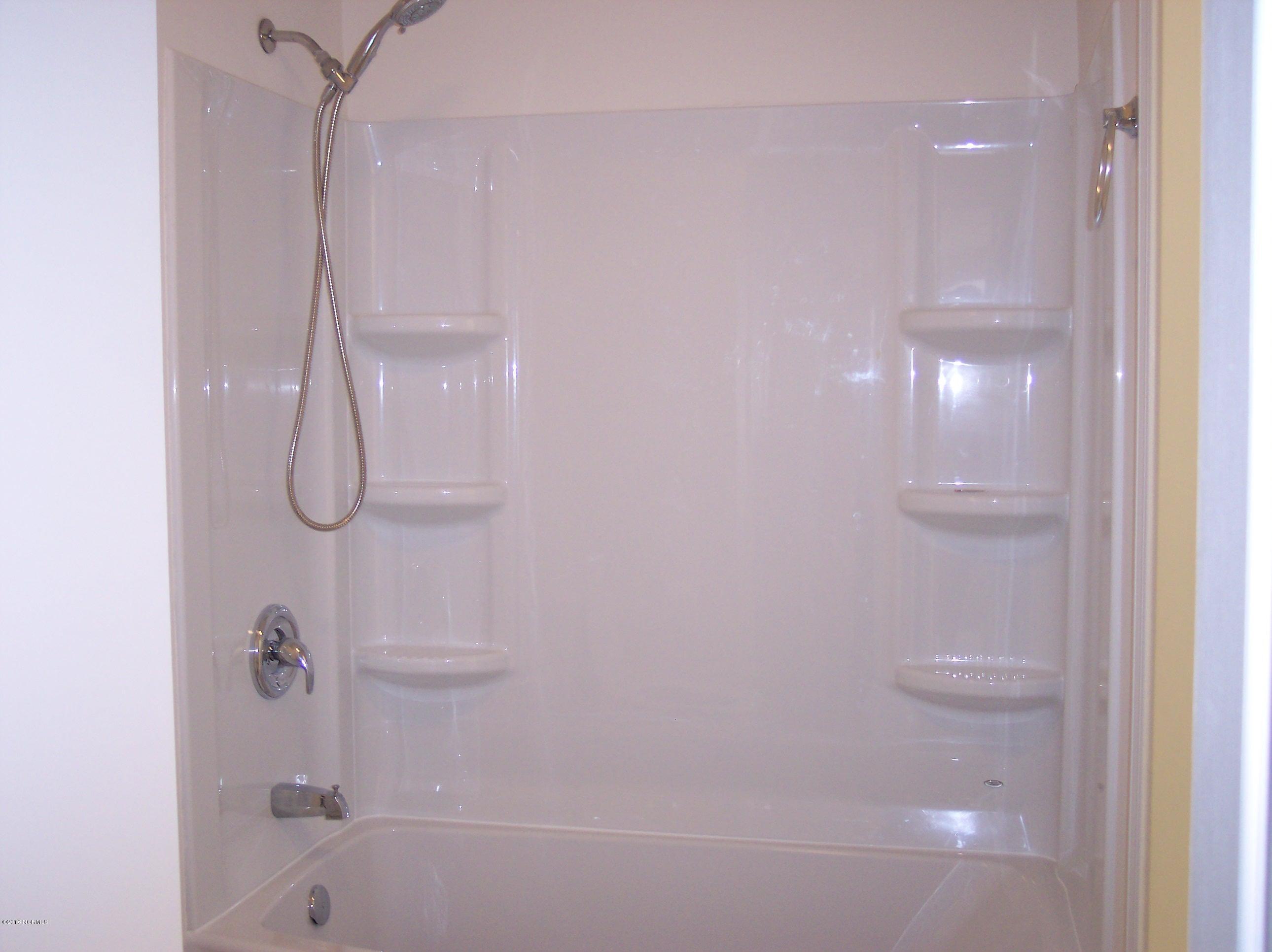 695 Pepperhill Road, Unit BSL Southport, NC 28461 - Photo 10 of 33 New tub, shower enclosure in master bathroom