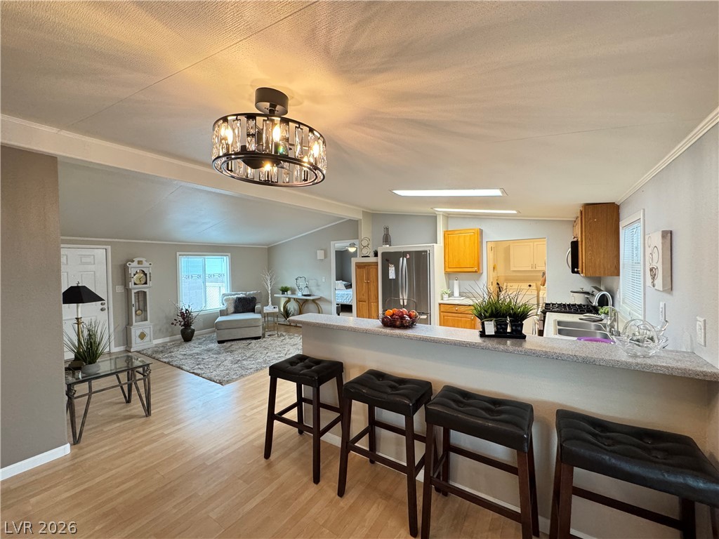 3250 Del Monte Street Laughlin, NV 89029 - Photo 13 of 57 View of family room and kitchen from dining area