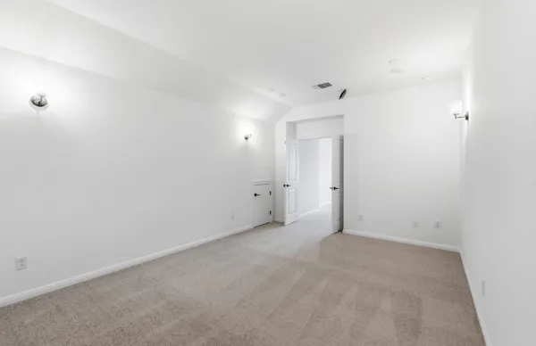 an empty room with an entryway