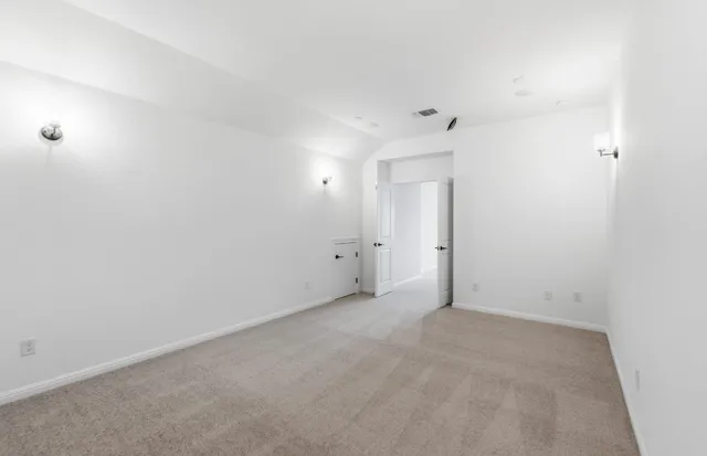 an empty room with an entryway