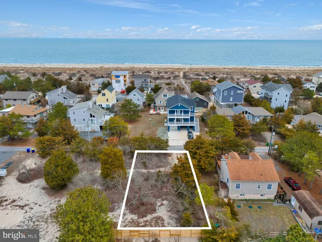an aerial view of a house with a garden