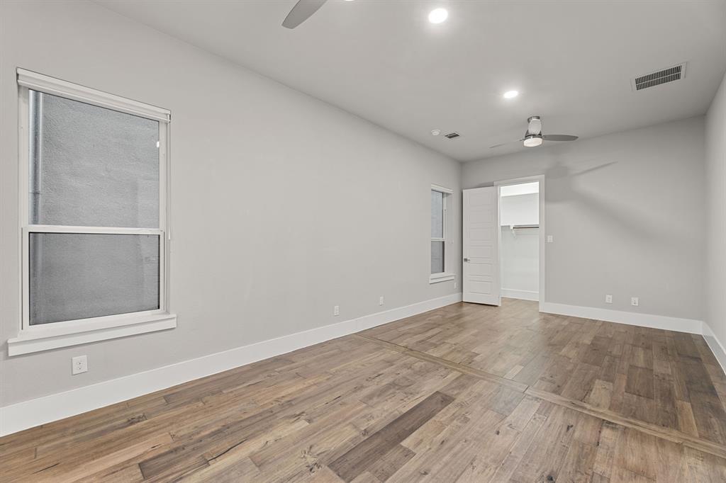 7854 Element Avenue Plano, TX 75024 - Photo 19 of 38 Unfurnished room with wood-type flooring, a ceiling fan, and recessed lighting