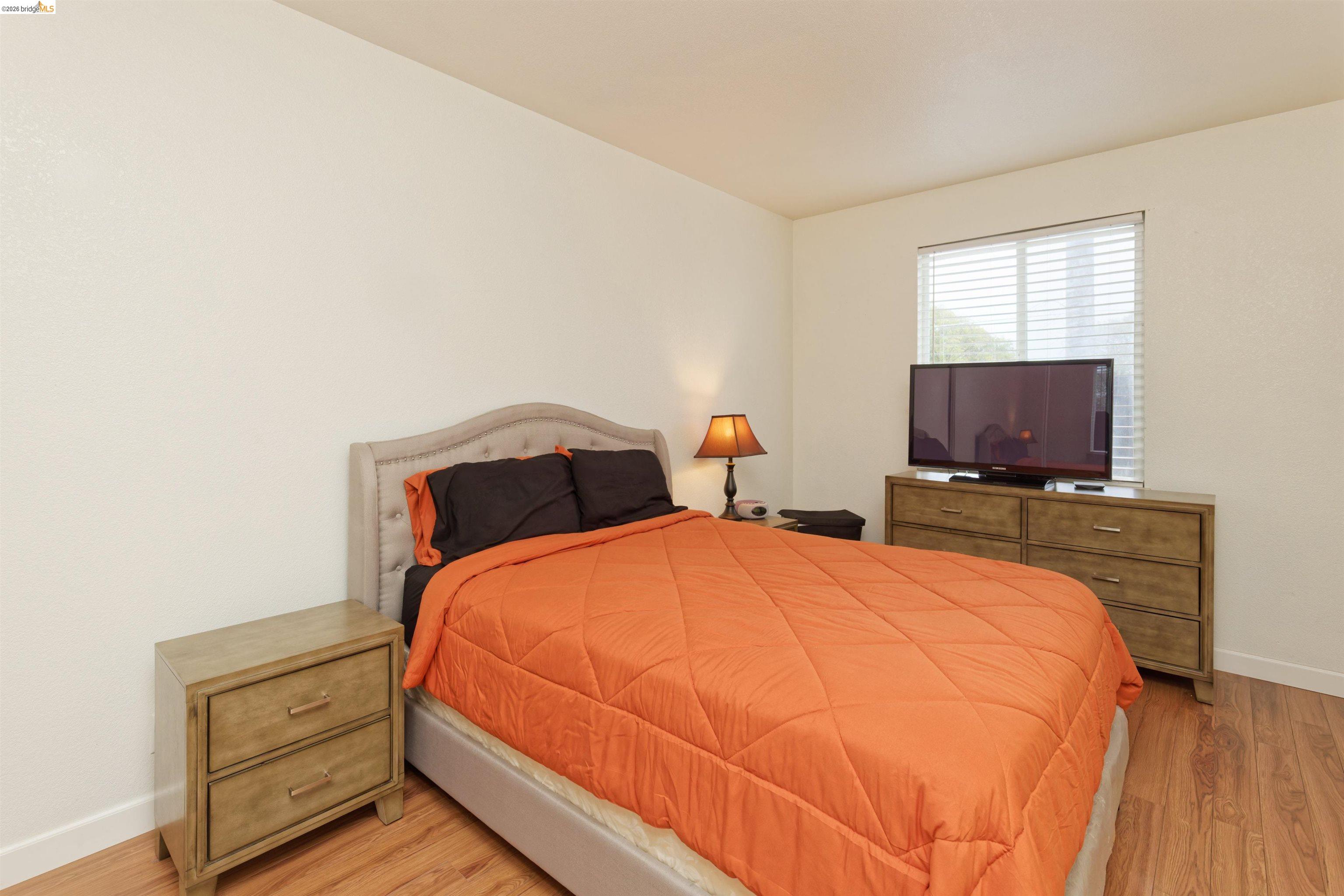 10 Leighty Court, Unit 5 Hayward, CA 94541 - Photo 16 of 22 Bedroom with light wood-style floors
