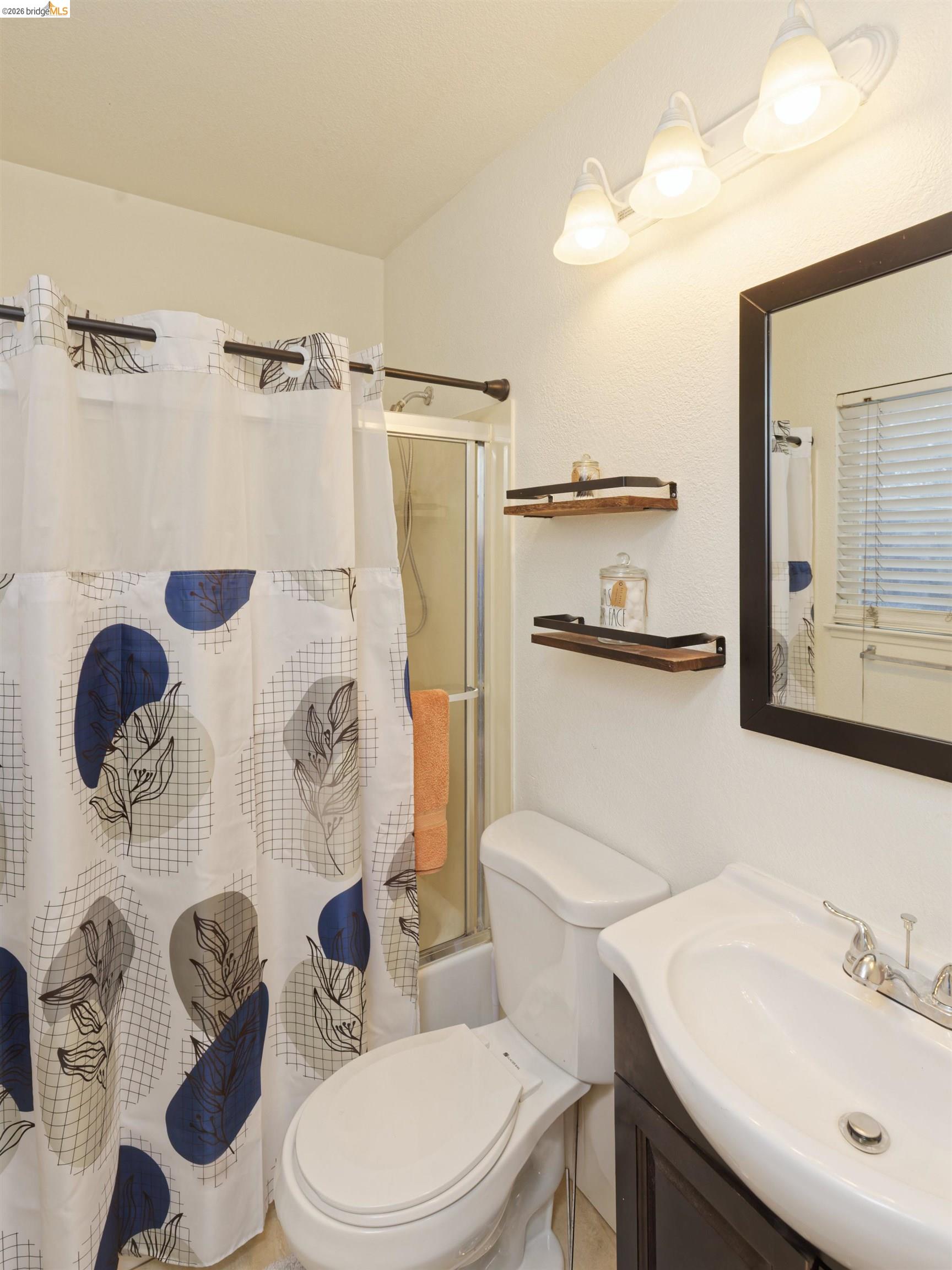 10 Leighty Court, Unit 5 Hayward, CA 94541 - Photo 18 of 22 Bathroom featuring vanity and shower / tub combo