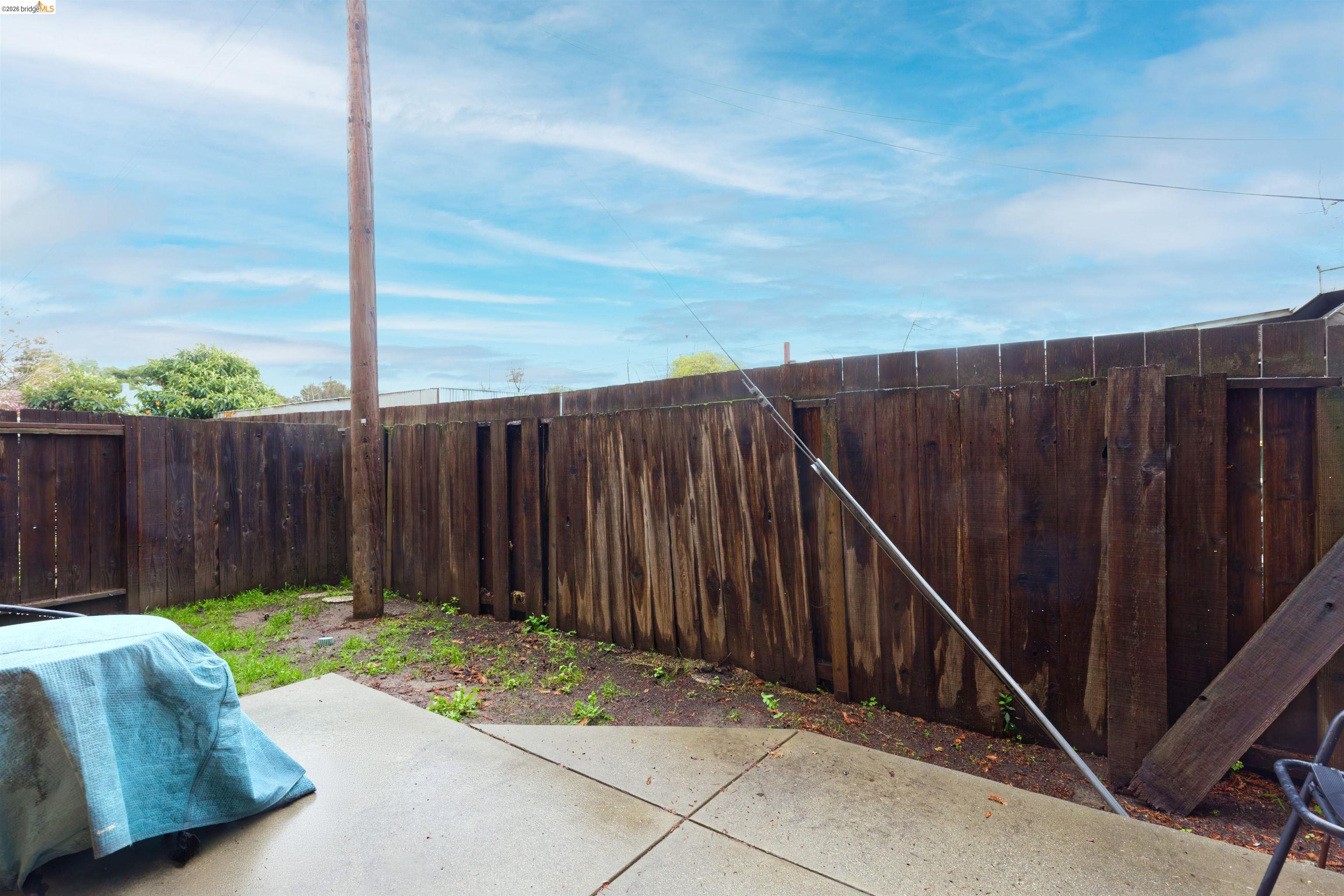 10 Leighty Court, Unit 5 Hayward, CA 94541 - Photo 21 of 22 Fenced backyard with a patio area