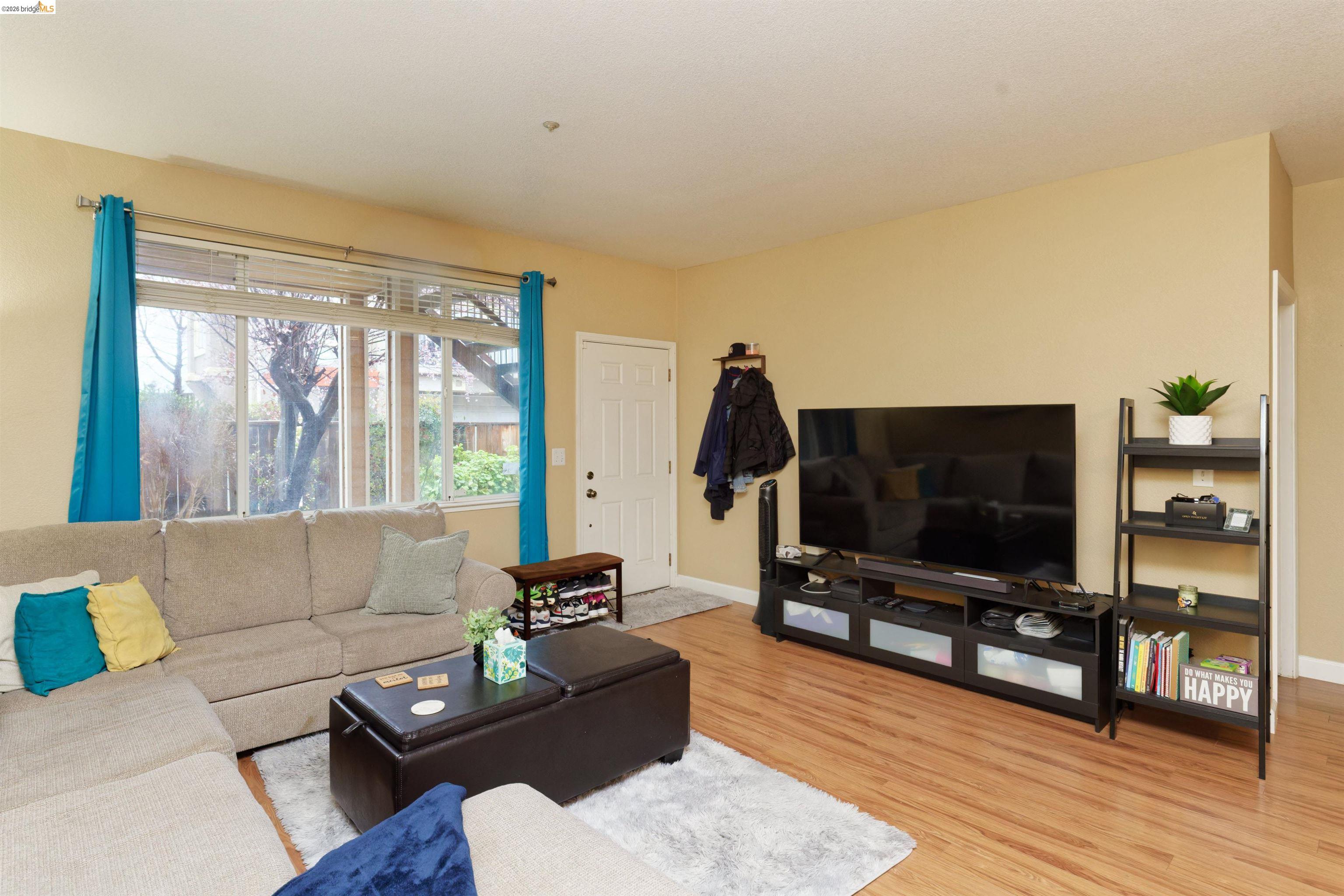 10 Leighty Court, Unit 5 Hayward, CA 94541 - Photo 7 of 22 Living room featuring light wood-type flooring and baseboards