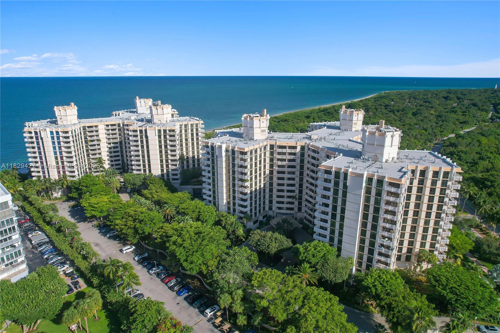 1121 Crandon Boulevard, Unit F201 Key Biscayne, FL 33149 - Photo 2 of 56 a view of a city with tall buildings