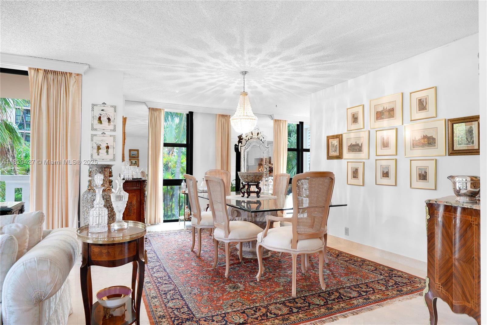 1121 Crandon Boulevard, Unit F201 Key Biscayne, FL 33149 - Photo 22 of 56 a view of a dining room with furniture window and wooden floor