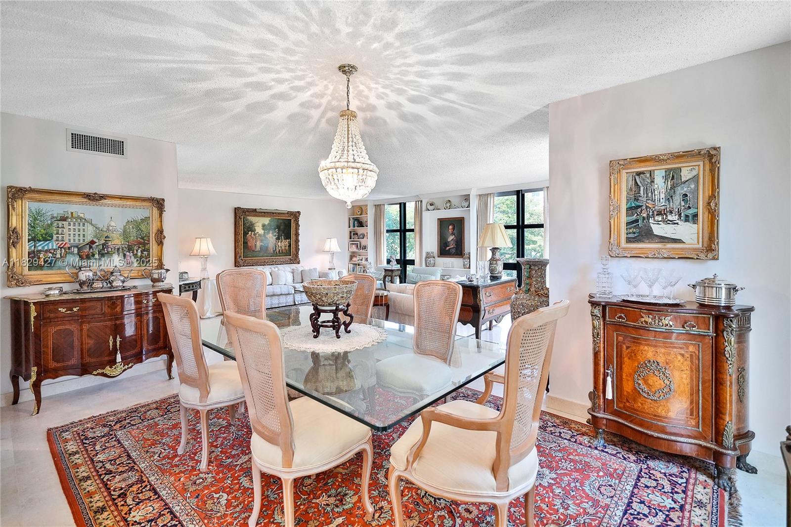 1121 Crandon Boulevard, Unit F201 Key Biscayne, FL 33149 - Photo 34 of 56 a view of a dining room with furniture