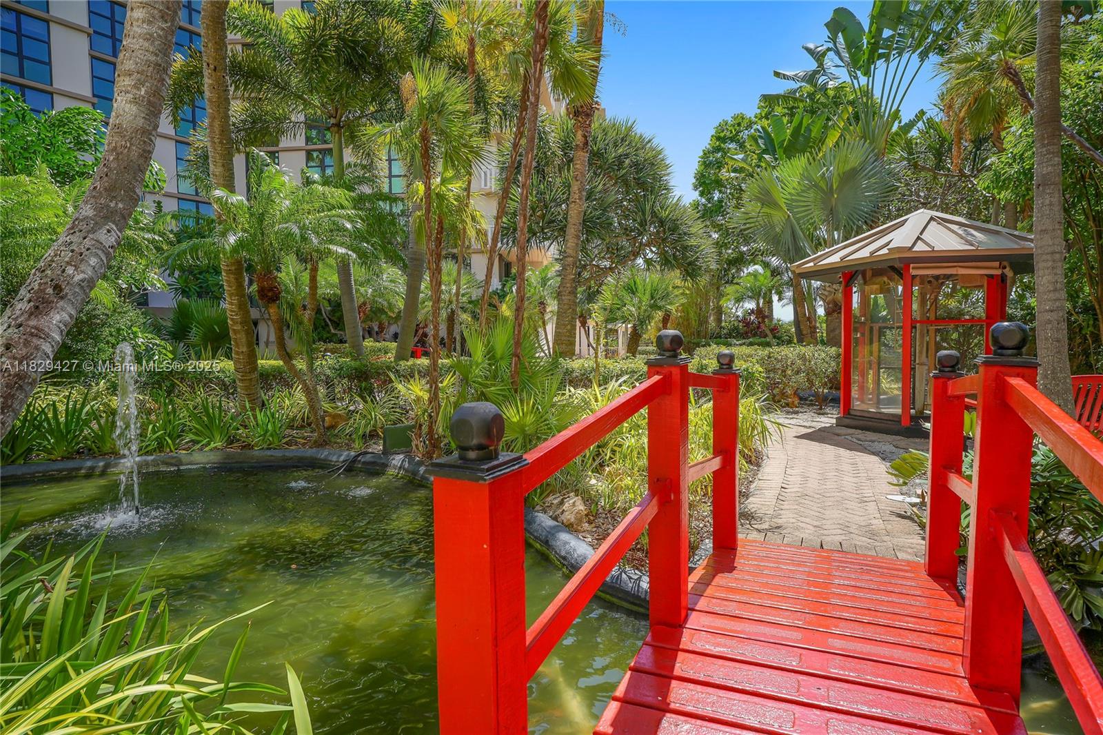 1121 Crandon Boulevard, Unit F201 Key Biscayne, FL 33149 - Photo 50 of 56 a view of an outdoor space deck and backyard