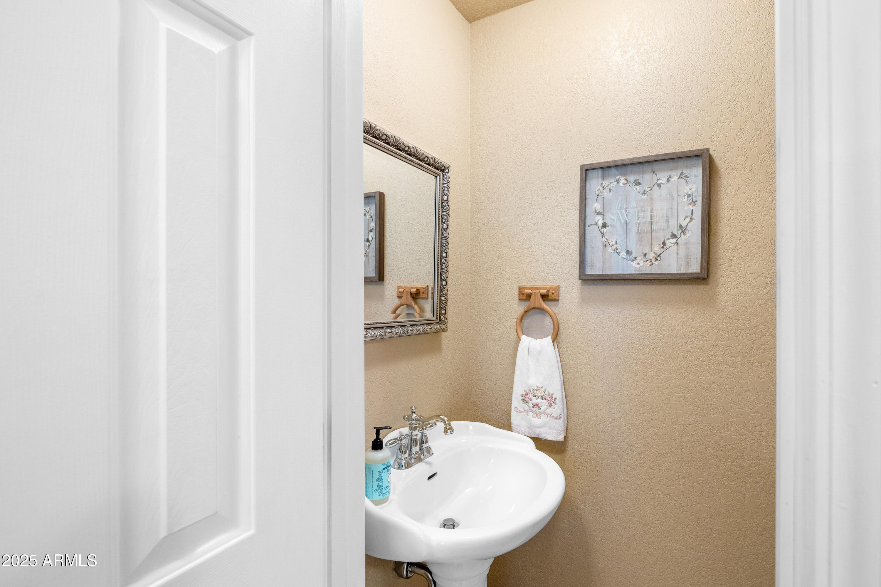 12870 Doyle Road Flagstaff, AZ 86004 - Photo 16 of 49 a bathroom with a sink and a mirror