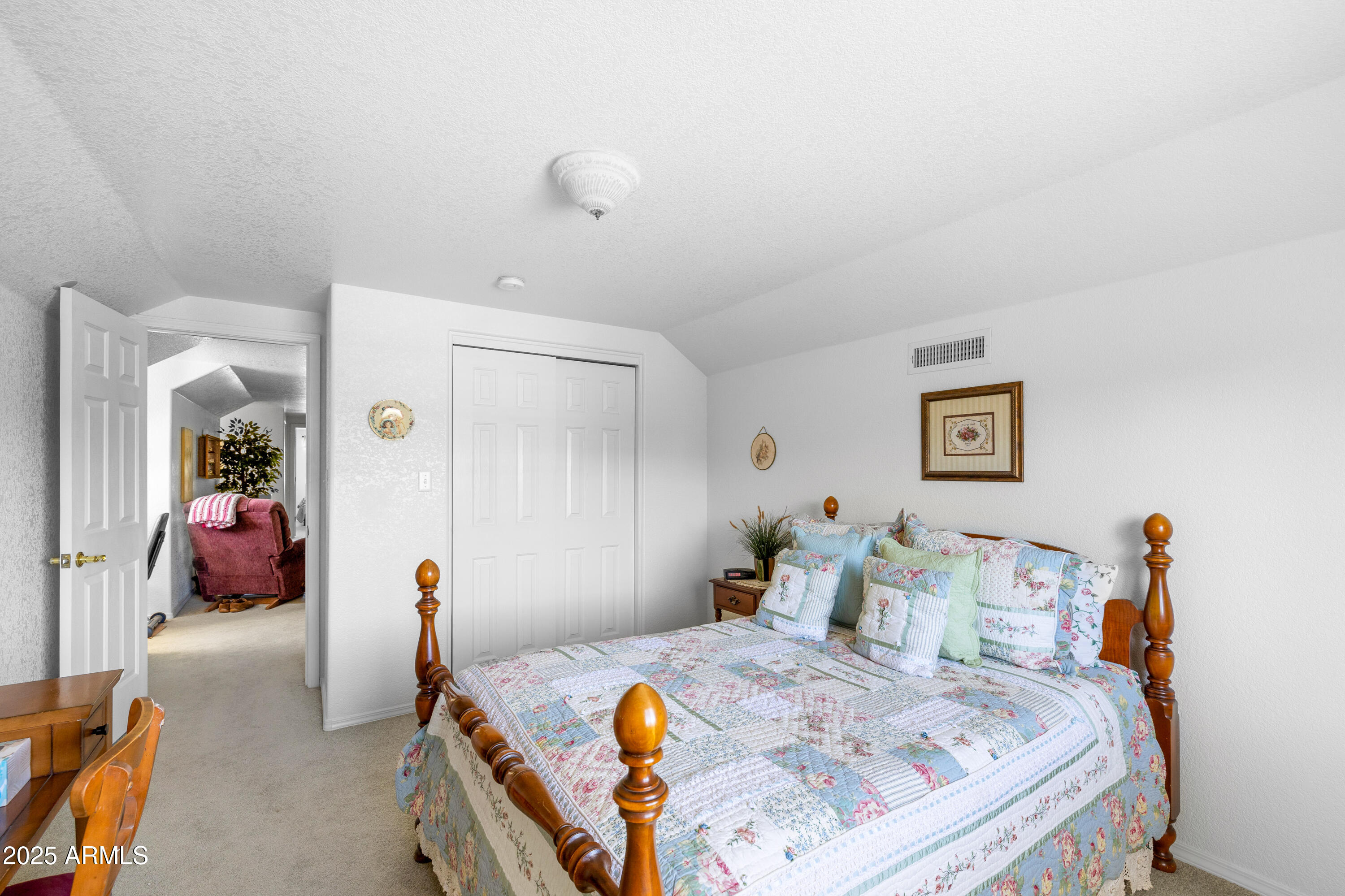 12870 Doyle Road Flagstaff, AZ 86004 - Photo 22 of 49 a bed room with furniture and a table