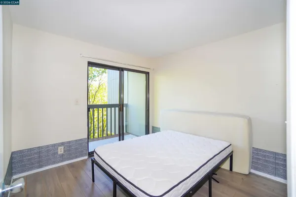 a view of a storage & utility room with a washer dryer