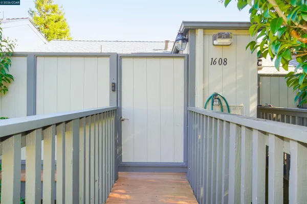 a bedroom with a bed and a table
