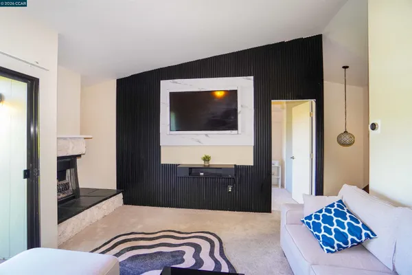 a bedroom with a bed and a view of bathroom