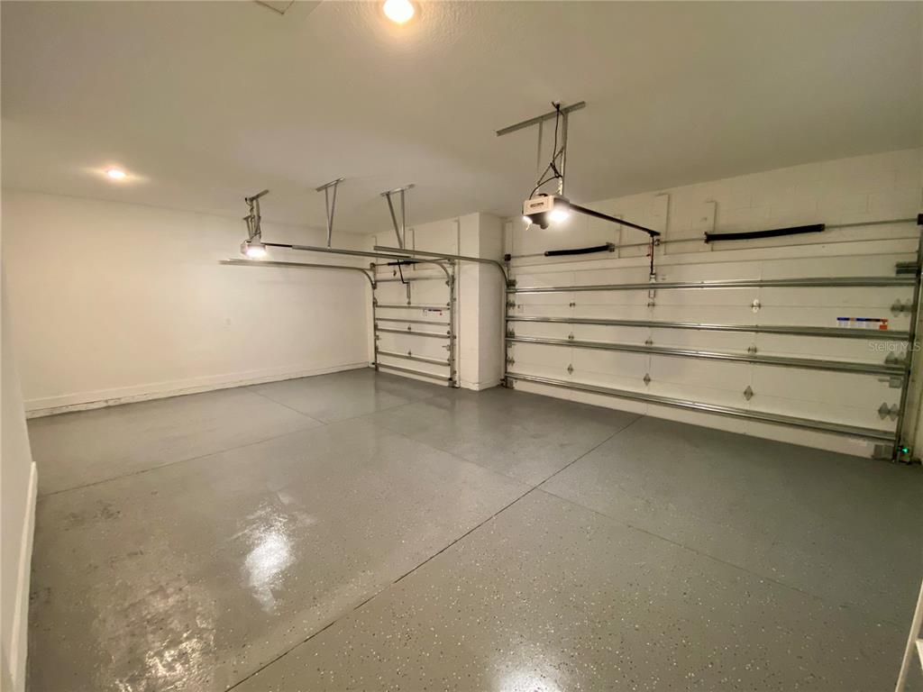 58 Overleaf Lane Orlando, FL 32839 - Photo 24 of 41 a view of a garage