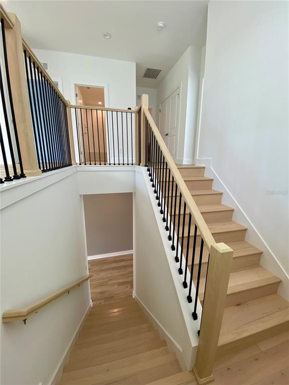 58 Overleaf Lane Orlando, FL 32839 - Photo 26 of 41 wooden floor view with staircase