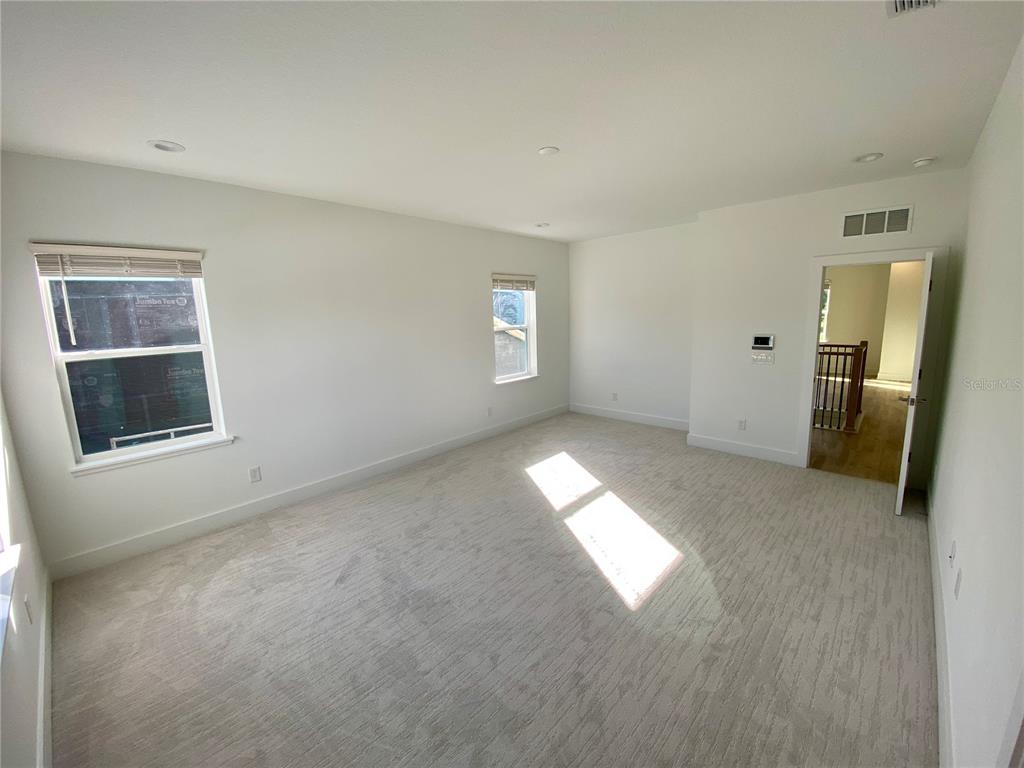 58 Overleaf Lane Orlando, FL 32839 - Photo 5 of 41 a view of empty room with window